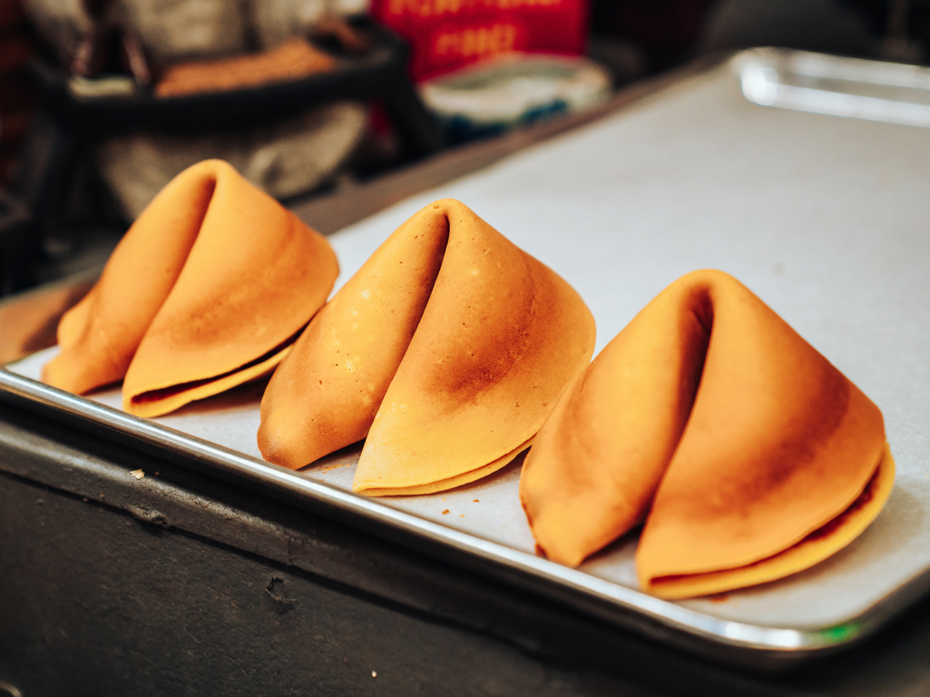 Fortune cookies on a baking sheet