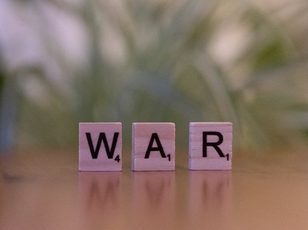 W-A-R Scrabble tiles
