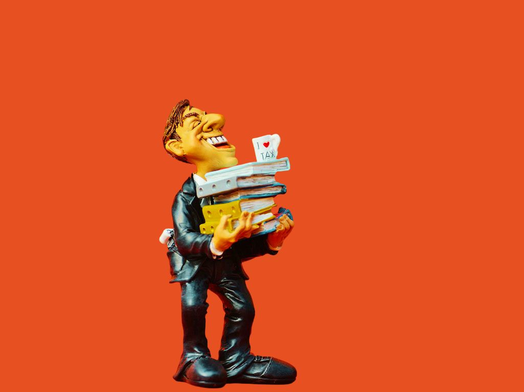 Laughing tax consultant figurine