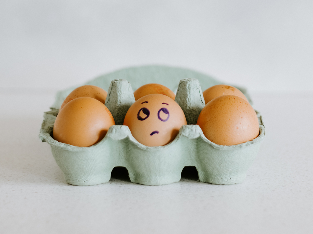 Egg with worried face drawn on the shell